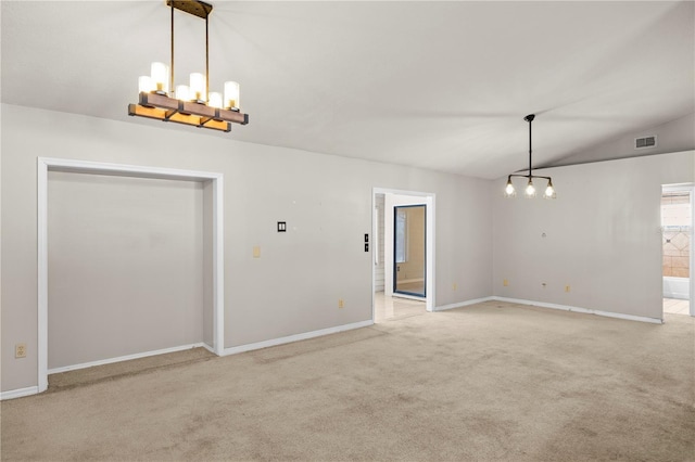 unfurnished dining area with visible vents, baseboards, a chandelier, light colored carpet, and lofted ceiling