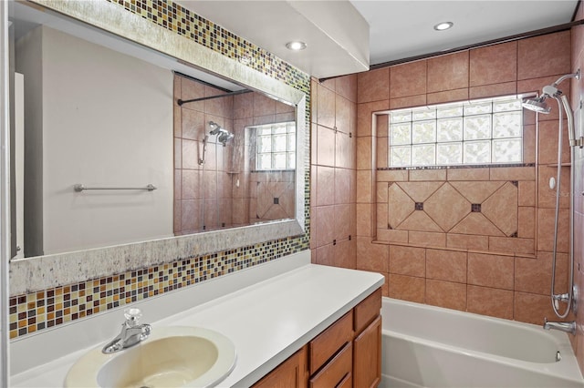 full bath featuring a wealth of natural light, recessed lighting, vanity, and shower / bath combination