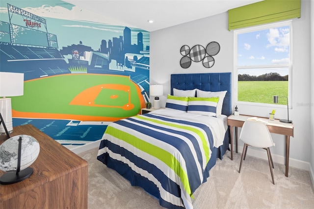 carpeted bedroom featuring vaulted ceiling and baseboards