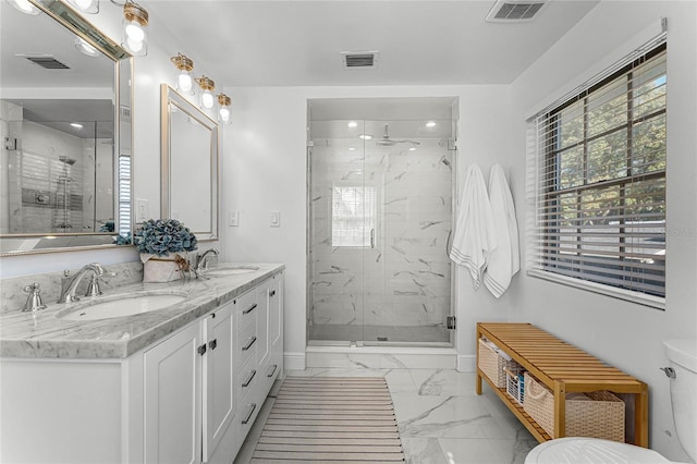 full bathroom featuring visible vents, marble finish floor, and a sink