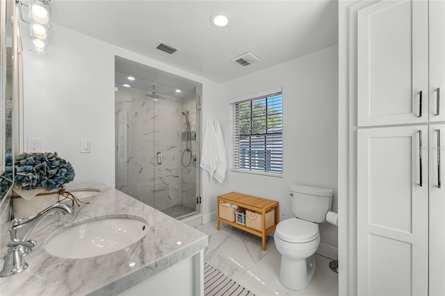 bathroom with visible vents, a marble finish shower, a sink, toilet, and marble finish floor