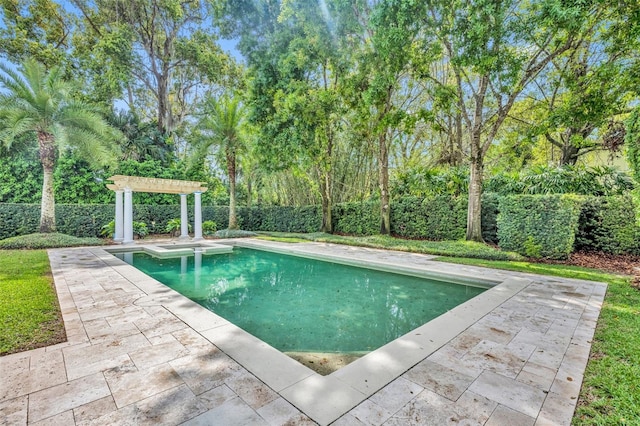 view of swimming pool featuring a fenced in pool, fence, and a patio area