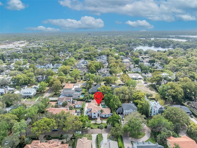 bird's eye view featuring a residential view and a water view