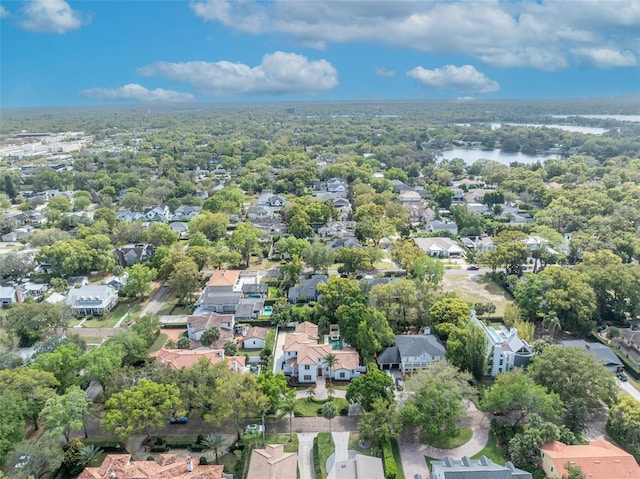 bird's eye view with a residential view and a water view