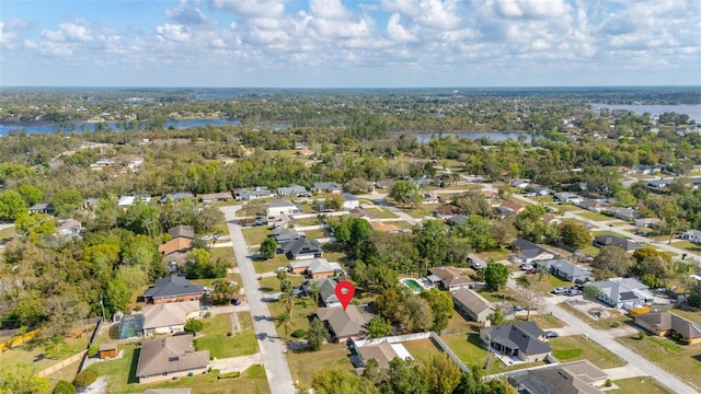 bird's eye view with a residential view and a water view