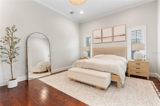 bedroom with visible vents, ornamental molding, recessed lighting, baseboards, and dark wood-style flooring