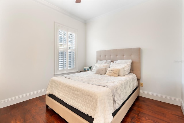 bedroom featuring ceiling fan, baseboards, ornamental molding, and dark wood-style flooring