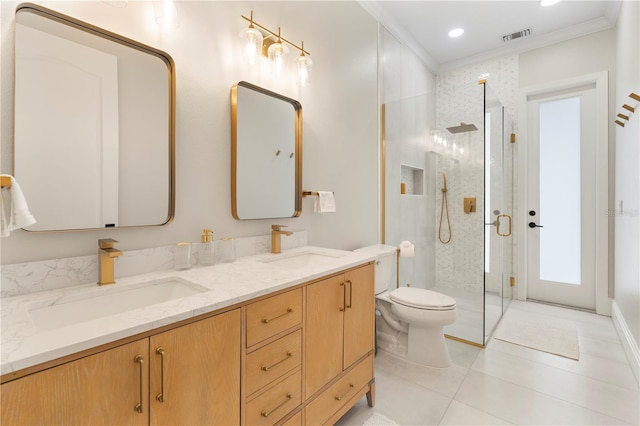 bathroom with a sink, visible vents, toilet, and a stall shower