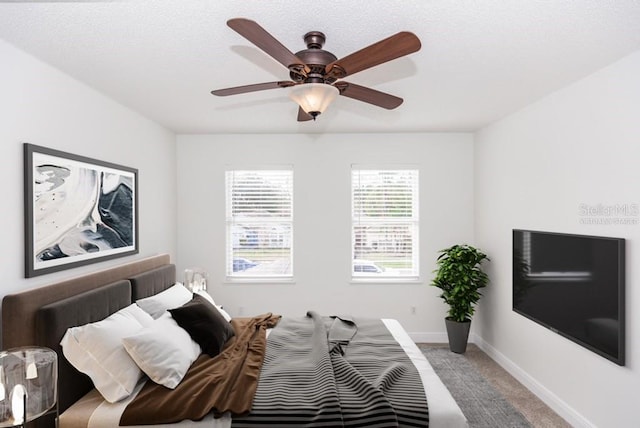 2217 Wekiva Reserve Blvd, Apopka, FL 32703 - bedroom featuring carpet flooring, baseboards, and a ceiling fan