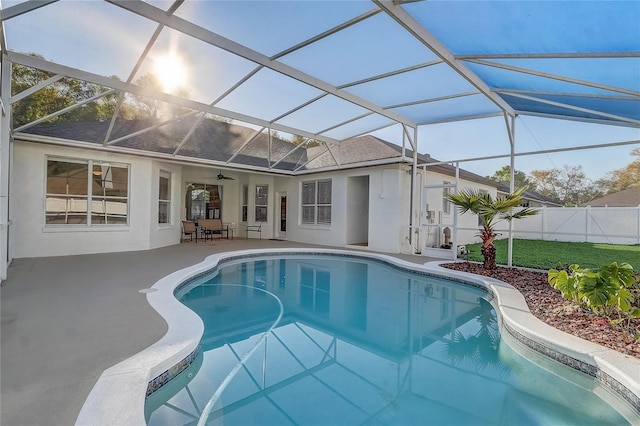 view of pool featuring a fenced in pool, fence, a lanai, and a patio area