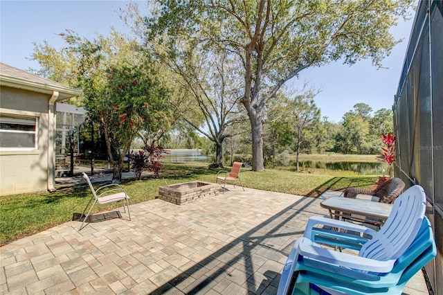 view of patio / terrace featuring a fire pit