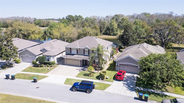 birds eye view of property with a residential view