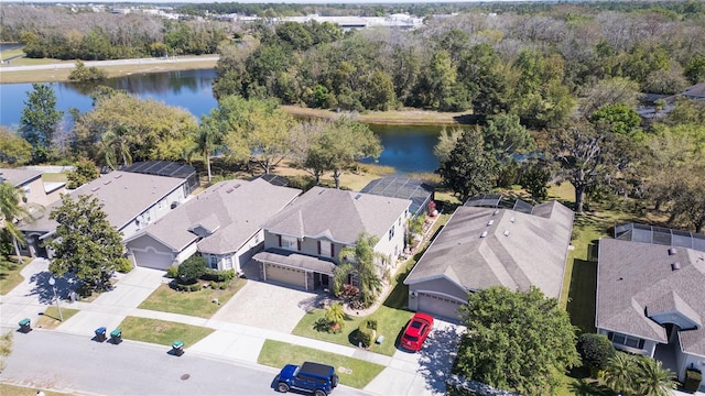 bird's eye view with a residential view and a water view