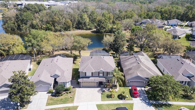 bird's eye view featuring a residential view and a water view