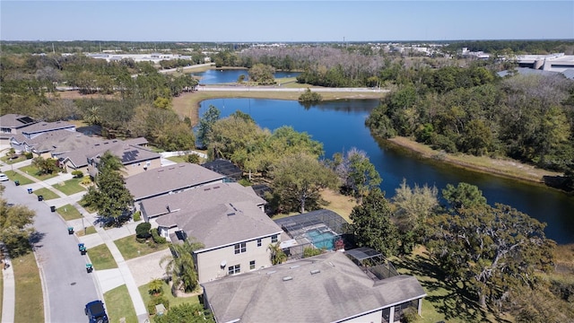 birds eye view of property with a residential view and a water view