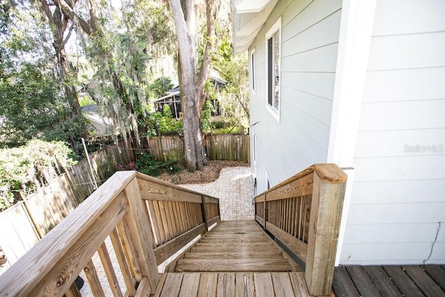 wooden deck featuring fence