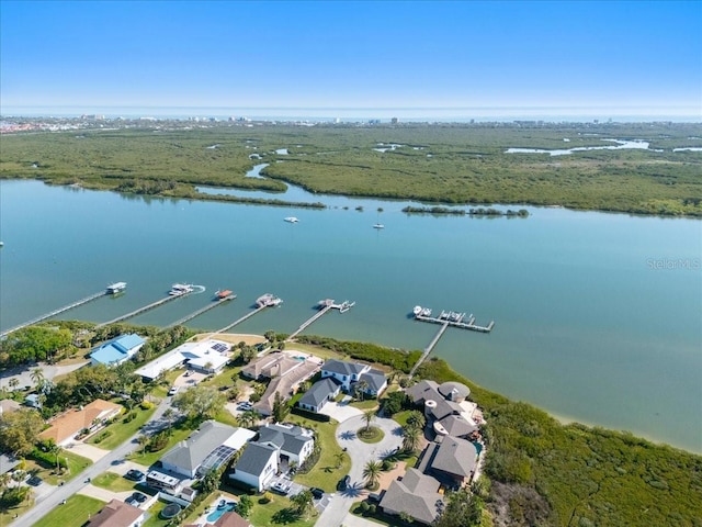 aerial view featuring a residential view and a water view