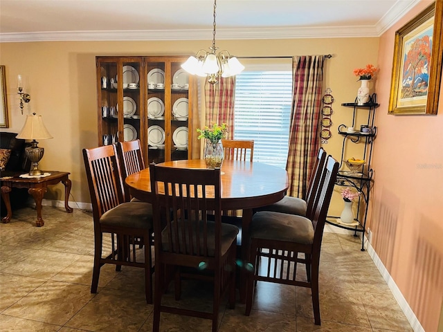 dining space with baseboards, an inviting chandelier, and crown molding