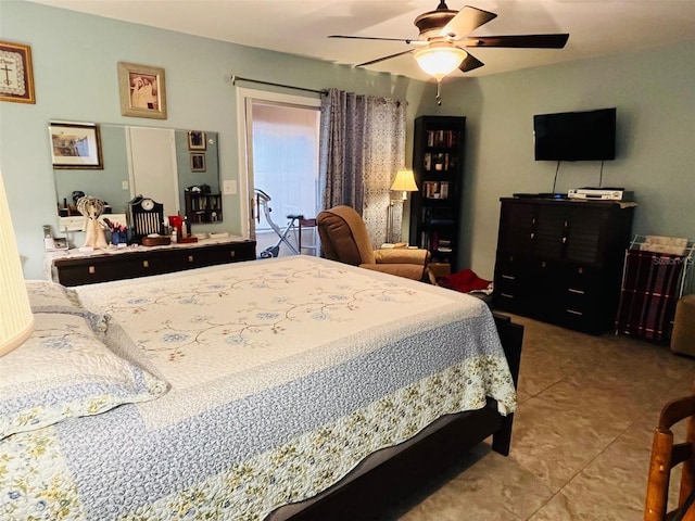 bedroom featuring tile patterned flooring and ceiling fan