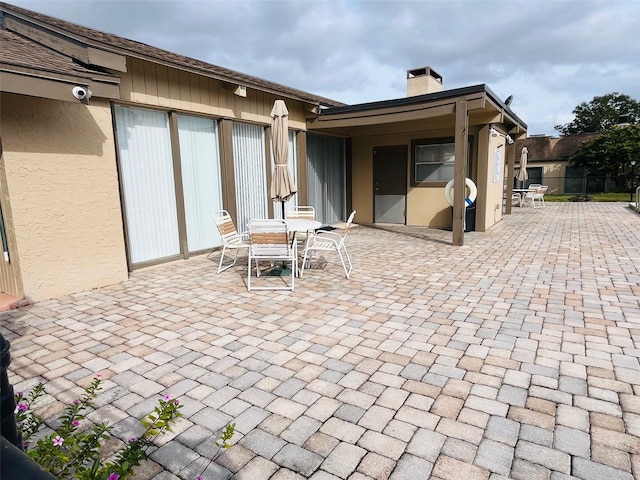 view of patio with outdoor dining space