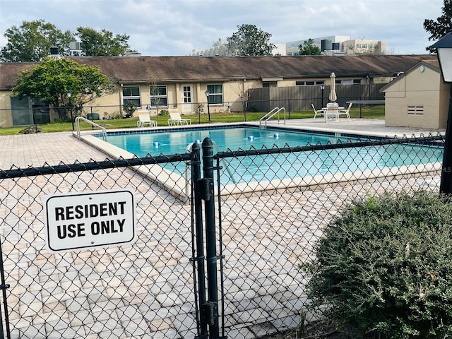 community pool with fence