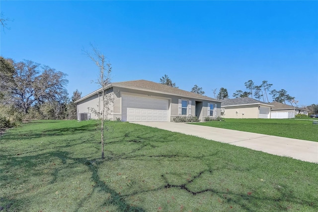 ranch-style home featuring stucco siding, an attached garage, concrete driveway, and a front yard