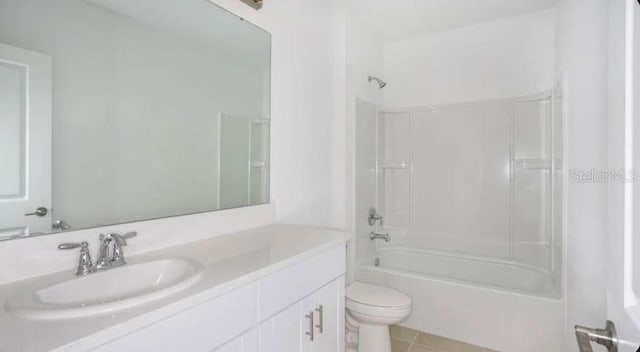 full bathroom with vanity, tile patterned floors, toilet, and tub / shower combination