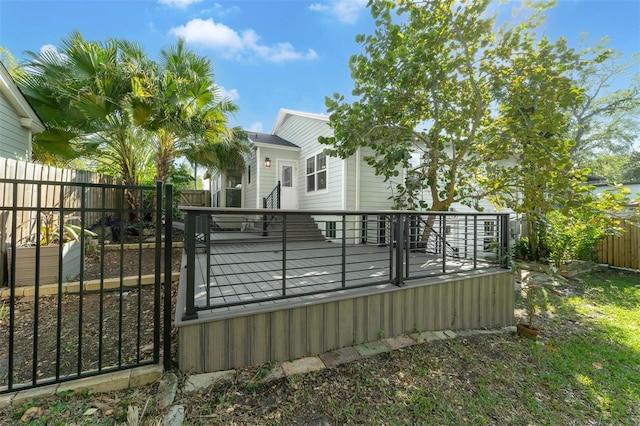 exterior space featuring a deck and a fenced backyard