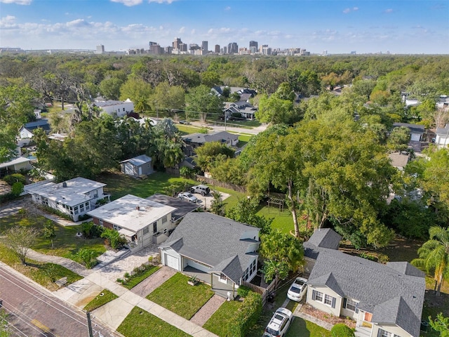 birds eye view of property with a city view