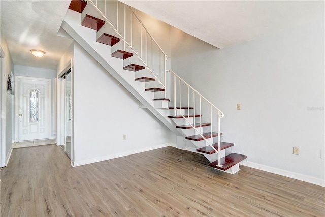 1318 Chebon Ct Unit E-F, Unit E-F, Apopka, FL 32712 - stairs featuring baseboards and wood finished floors