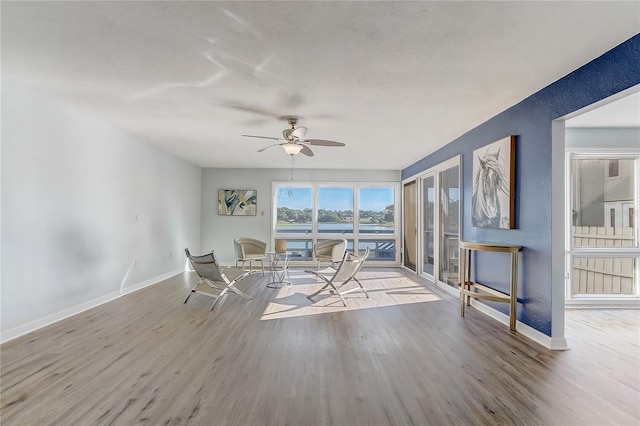 1318 Chebon Ct Unit E-F, Unit E-F, Apopka, FL 32712 - interior space with wood finished floors, a water view, and baseboards