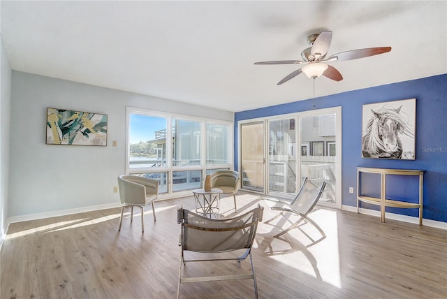 1318 Chebon Ct Unit E-F, Unit E-F, Apopka, FL 32712 - interior space with wood finished floors, ceiling fan, and baseboards