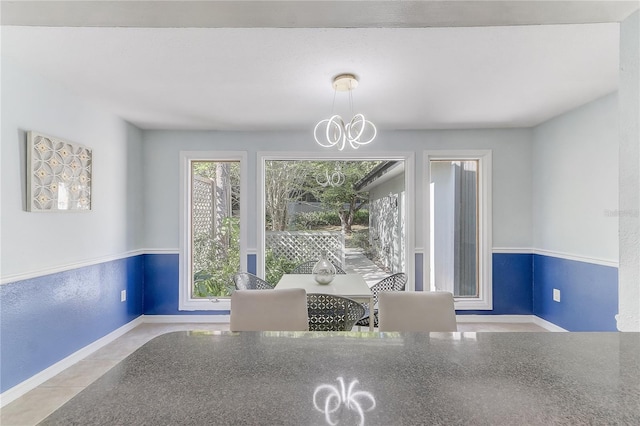 1318 Chebon Ct Unit E-F, Unit E-F, Apopka, FL 32712 - dining room featuring an inviting chandelier and baseboards