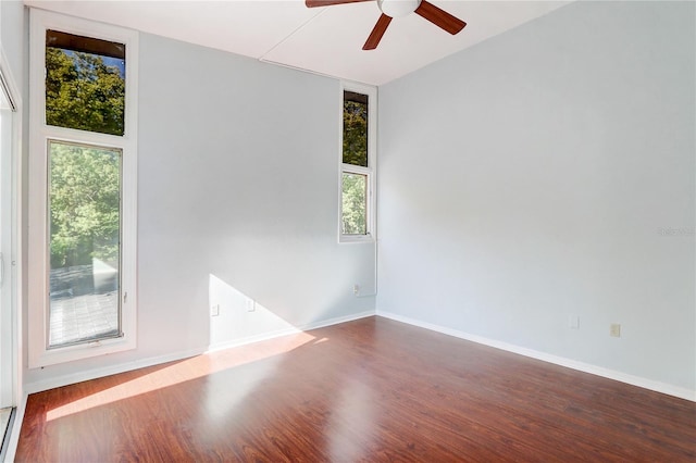 1318 Chebon Ct Unit E-F, Unit E-F, Apopka, FL 32712 - empty room featuring wood finished floors, ceiling fan, and baseboards