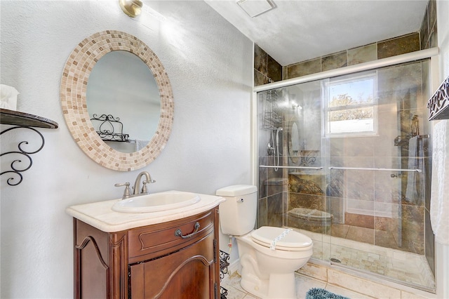 1318 Chebon Ct Unit E-F, Unit E-F, Apopka, FL 32712 - full bath featuring tile patterned floors, a shower stall, toilet, a textured wall, and vanity