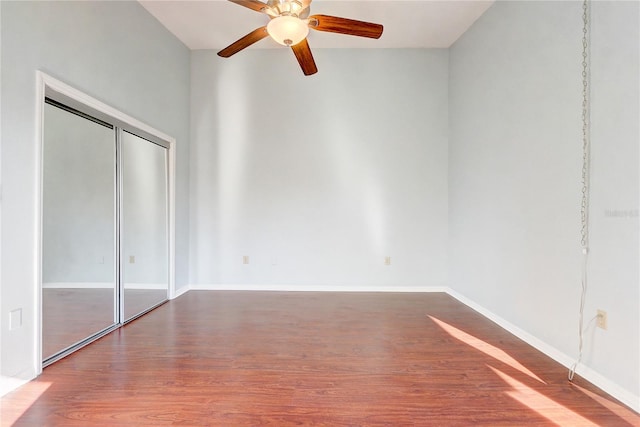 1318 Chebon Ct Unit E-F, Unit E-F, Apopka, FL 32712 - unfurnished bedroom featuring a closet, ceiling fan, wood finished floors, and baseboards