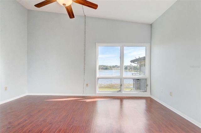 1318 Chebon Ct Unit E-F, Unit E-F, Apopka, FL 32712 - unfurnished room featuring wood finished floors, a ceiling fan, a water view, and baseboards