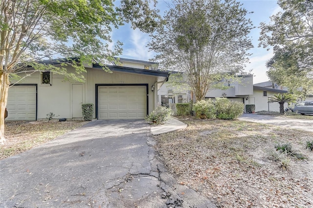 1318 Chebon Ct Unit E-F, Unit E-F, Apopka, FL 32712 - view of front of property featuring driveway and a garage