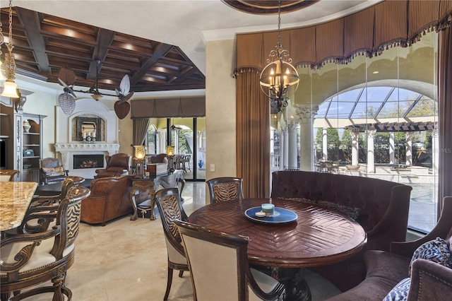 dining space featuring beamed ceiling, ornamental molding, coffered ceiling, a high ceiling, and a fireplace