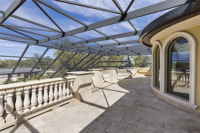 view of patio / terrace with a lanai