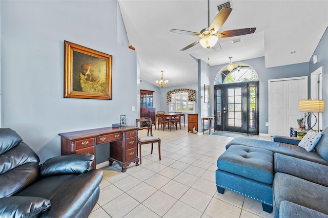 3580 Savannahs Trl, Merritt Island, FL 32953 - living area featuring ceiling fan with notable chandelier, light tile patterned flooring, visible vents, and high vaulted ceiling