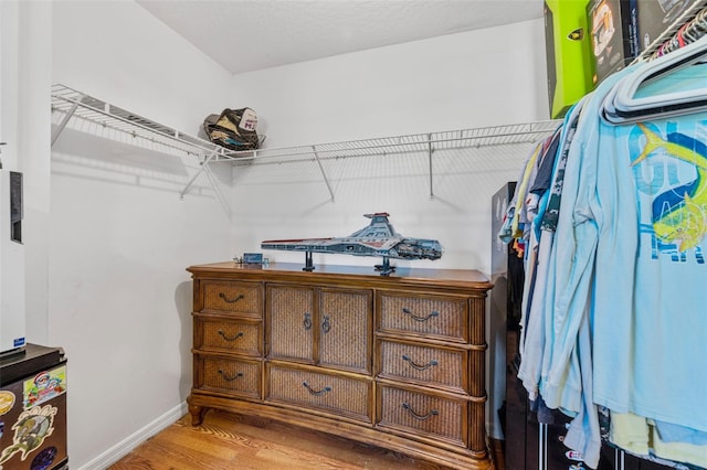 3580 Savannahs Trl, Merritt Island, FL 32953 - walk in closet featuring wood finished floors