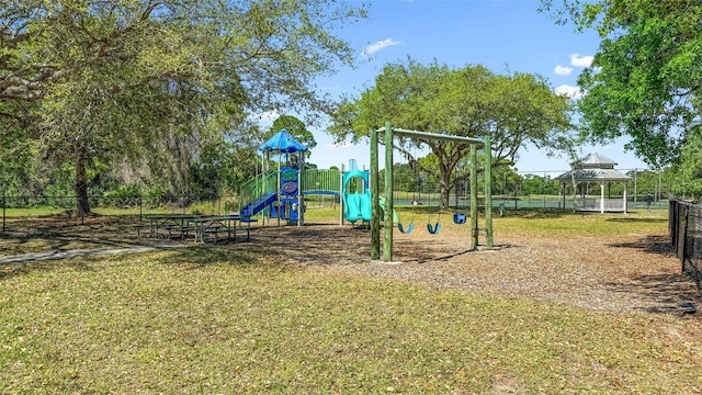 3580 Savannahs Trl, Merritt Island, FL 32953 - communal playground featuring a yard and fence