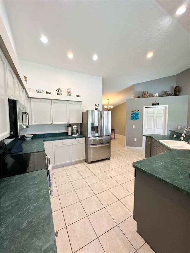 3580 Savannahs Trl, Merritt Island, FL 32953 - kitchen with a sink, light tile patterned floors, appliances with stainless steel finishes, and recessed lighting