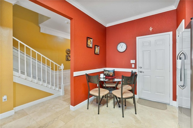 dining area with stairs, baseboards, and ornamental molding