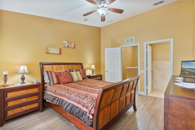 bedroom featuring visible vents and light wood finished floors