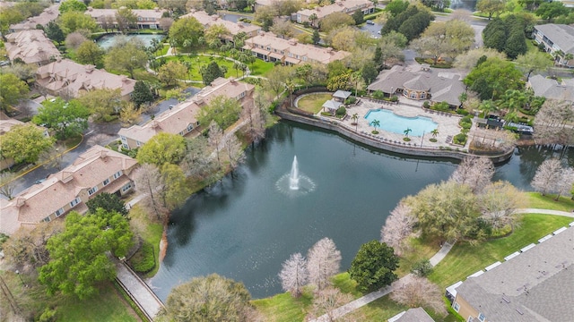 bird's eye view featuring a residential view and a water view