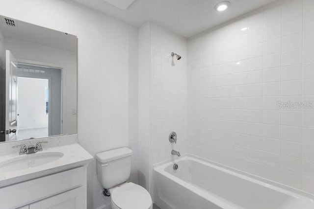 full bath featuring vanity,  shower combination, toilet, and visible vents