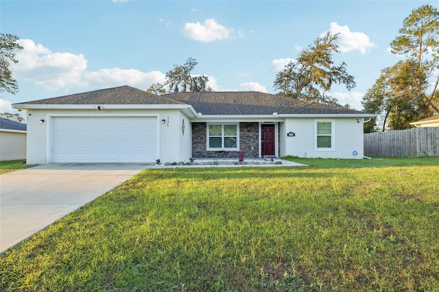 ranch-style home with stucco siding, driveway, fence, a front yard, and a garage