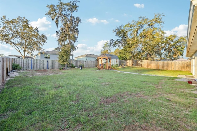 view of yard featuring a fenced backyard